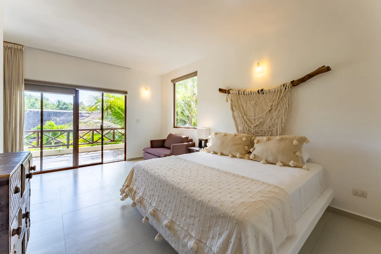 Pool and jungle setting at Bassé — boutique-hotel surroundings just one hour from Cancun