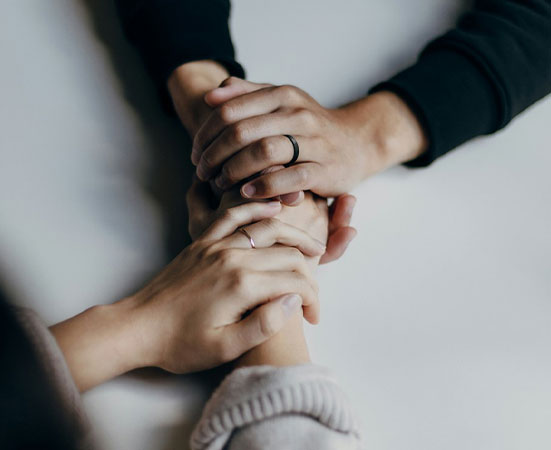 Hands clasped in support — Bassé's team is with you every step of the safety process